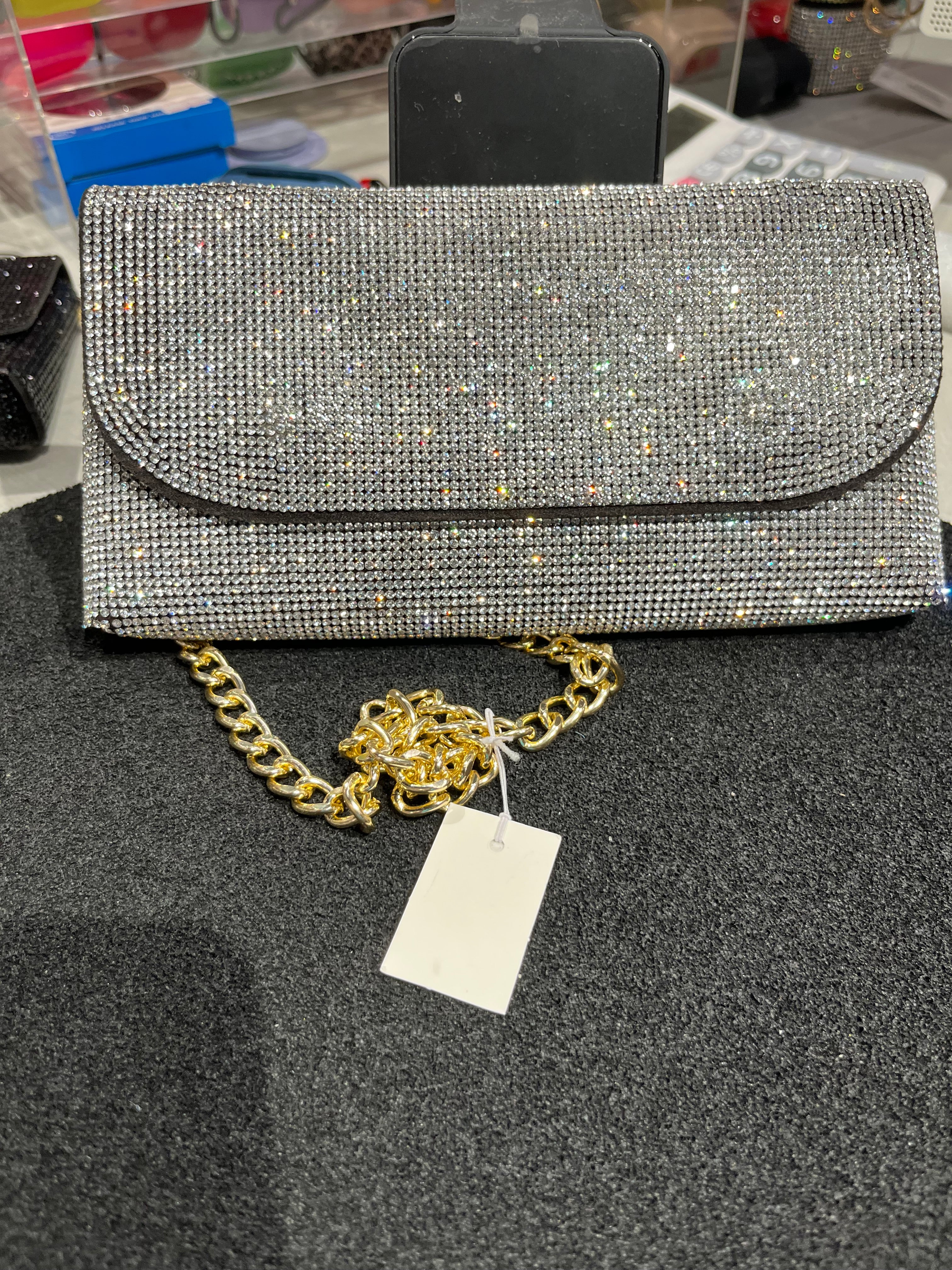 Pochette porta telefono con strass bianca